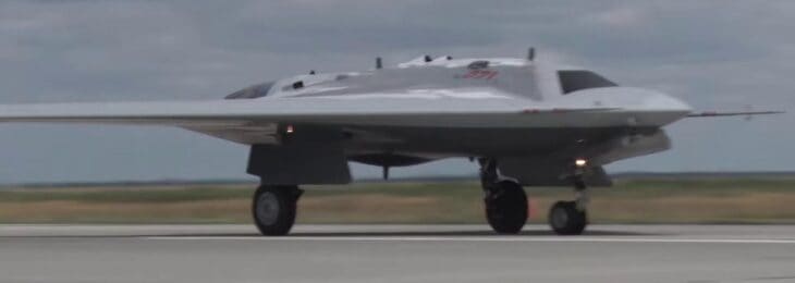 Sukhoi S-70 Okhotnik stealth flying wing on the runway during takeoff