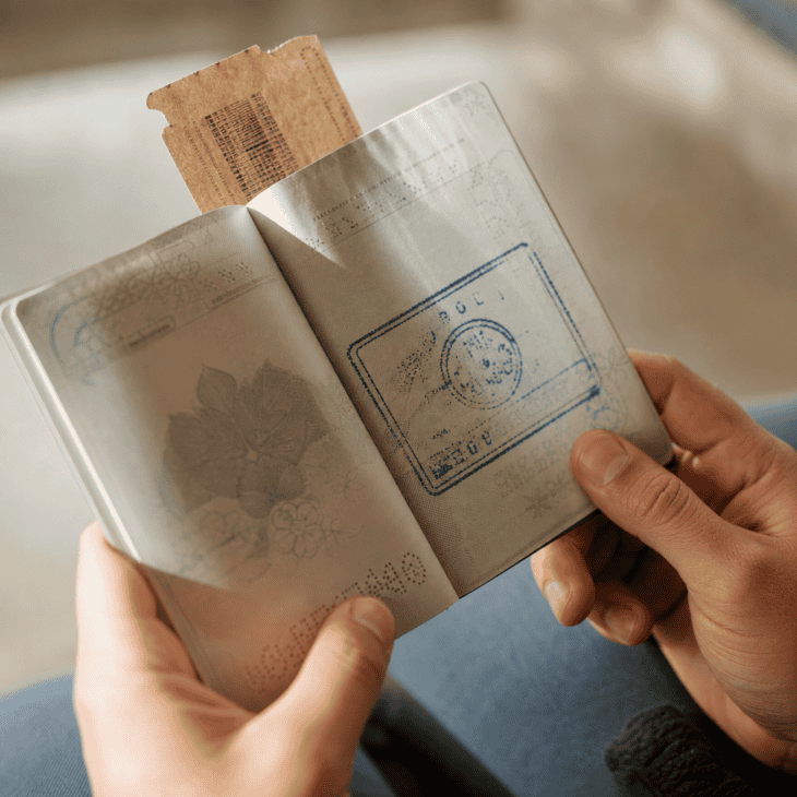 A fresh stamp and a folded stub are the smallest possible proof that the trip happened.