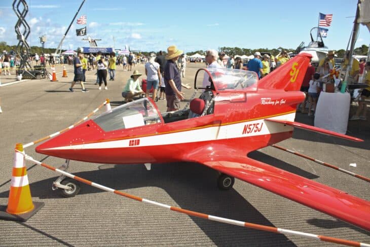 Red Bede BD-5J Micro N575J on display at an air show, with visitors behind it