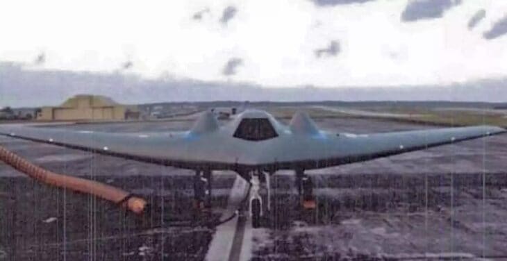 Grainy US Air Force photograph of the RQ-170 Sentinel flying-wing drone on a runway