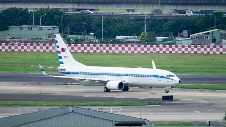 Republic of China Air Force Boeing 737-800, serial 3701, in white and blue government colours taxiing at Taipei Songshan