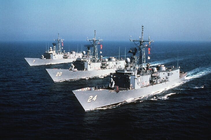 Two Oliver Hazard Perry-class frigates steaming side by side in 1982