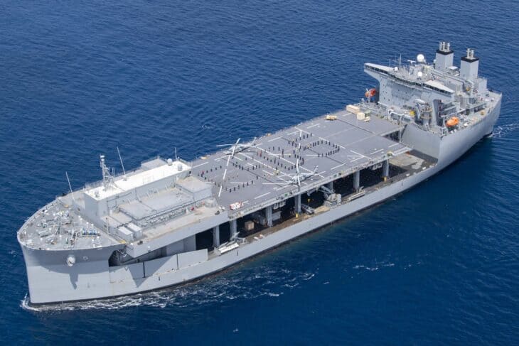 The expeditionary sea base USS Miguel Keith underway in the Pacific Ocean, showing its long open flight deck