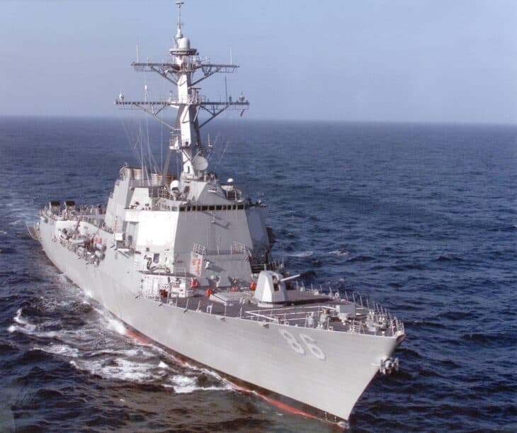 The Arleigh Burke-class guided missile destroyer USS Shoup seen from ahead while underway at sea