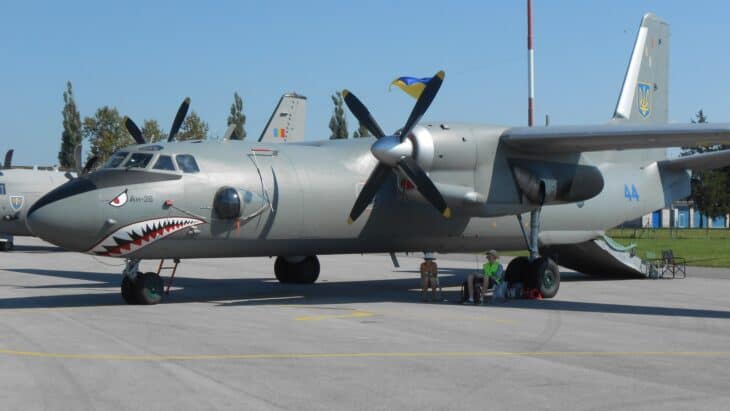 An Antonov An-26 twin-turboprop transport in Ukrainian Air Force markings on the ground