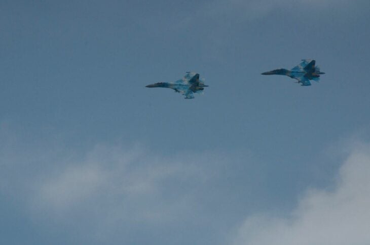 Ukrainian Air Force personnel standing in formation at a farewell ceremony for three pilots at Vasylkiv Air Base