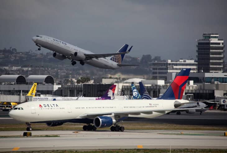 N825NW Airbus A330-302 Delta Airlines with Boeing 737-924ER of United Airlines on departure