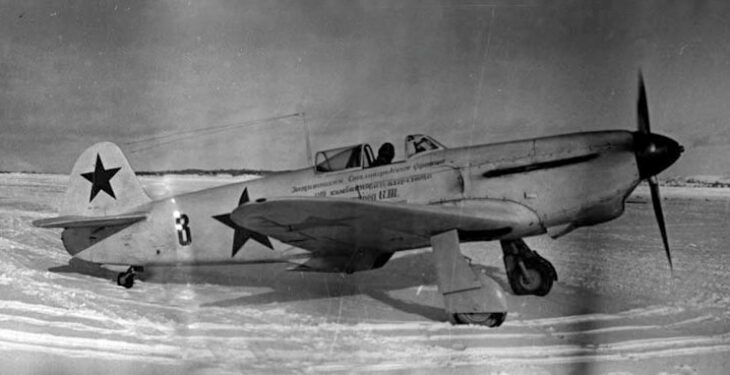 Yak-1B fighters of the 14th Guards Fighter Aviation Regiment at a field airfield before a combat mission crop
