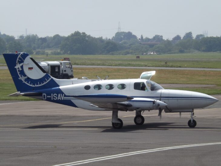 Cessna 402B Businessliner D-ISAV parked on an apron