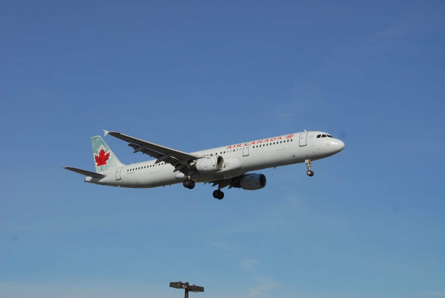 Air Canada Airbus A321 C-GITY in flight, banking with landing gear retracted