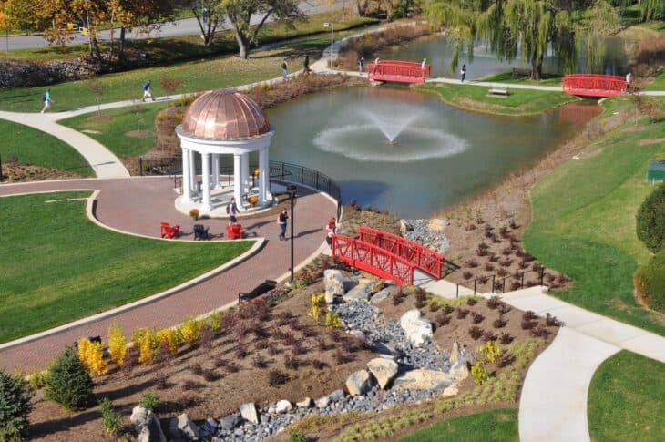 Aerial view of the Shenandoah University campus with a gazebo and pond