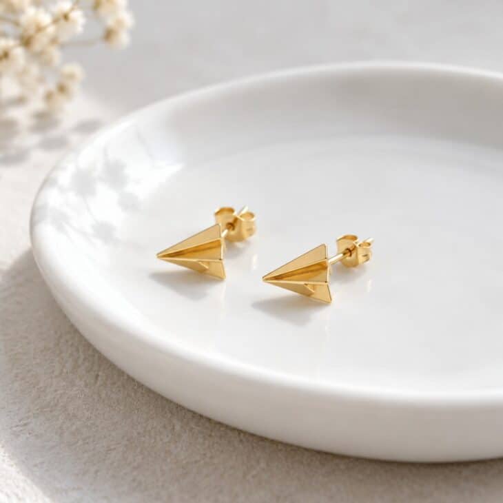 Tiny studs keep the aviation theme subtle.