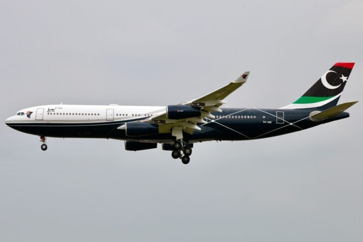 Airbus A340-200 5A-ONE in Libyan government colors on approach to London Heathrow