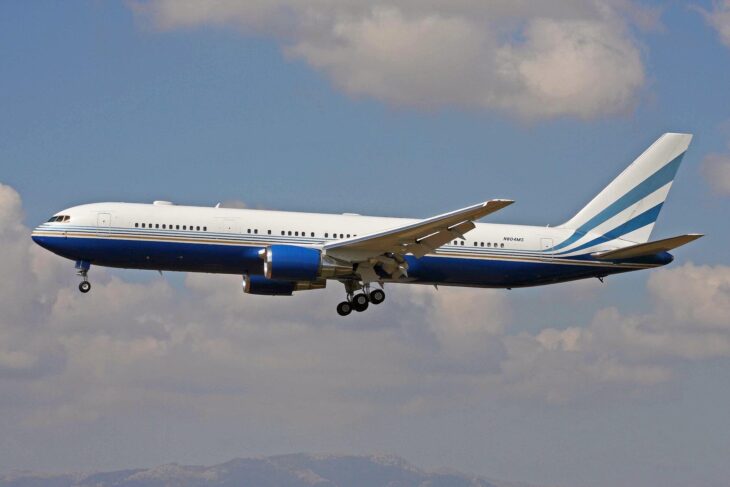 Boeing 767-300ER N804MS in Interface Operations blue and white colors on approach with gear down