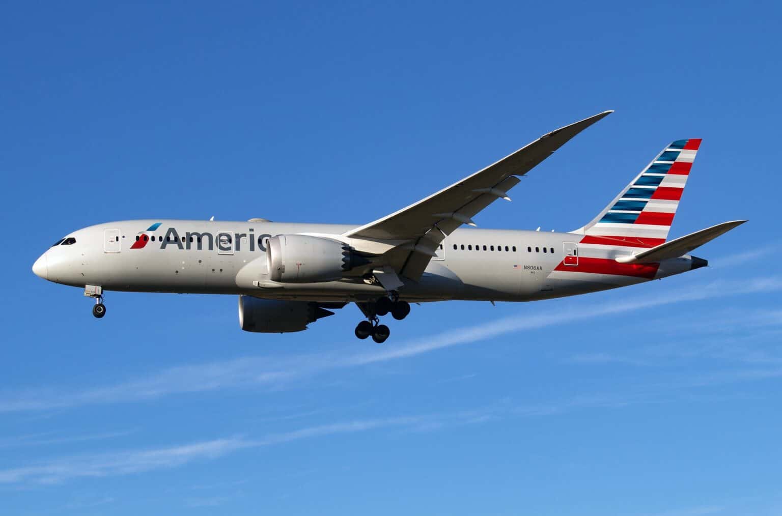 American Airlines Boeing 787-8 N806AA in flight with landing gear down
