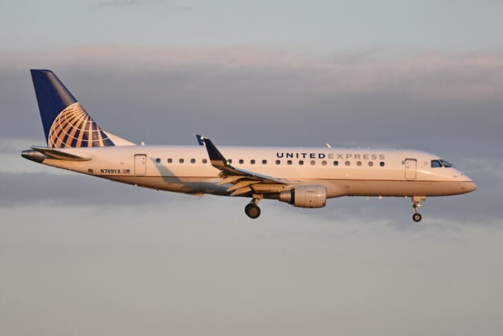 Republic Airways Embraer 175 N749YX in United Express colors on approach in evening light