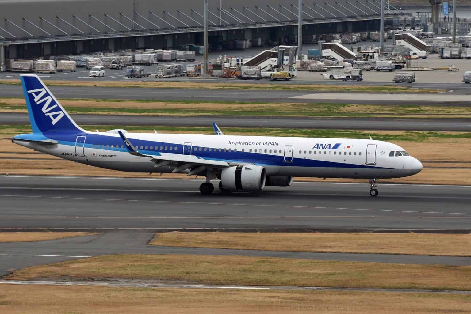 ANA Airbus A321neo JA132A taxiing at Tokyo Haneda in blue and white livery