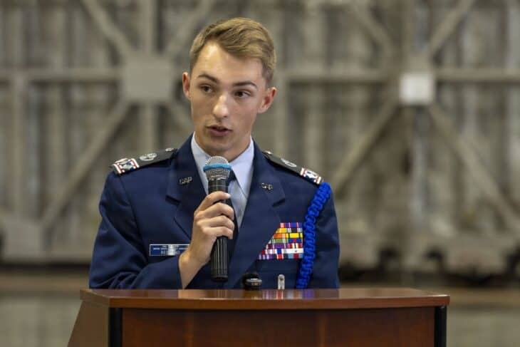 Civil Air Patrol cadet at a lectern in blue service dress uniform