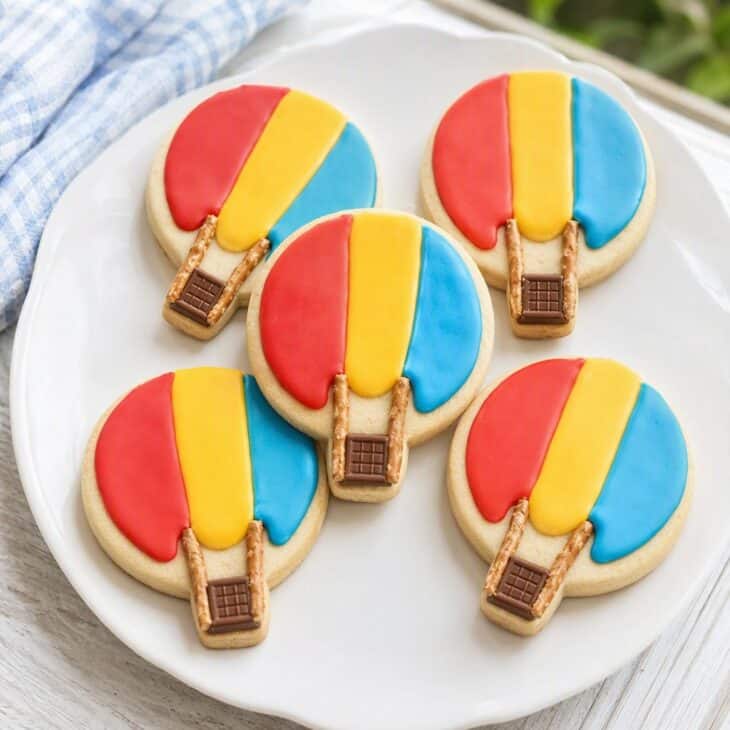 A round cookie, a few pretzel sticks and a chocolate square make one in minutes.
