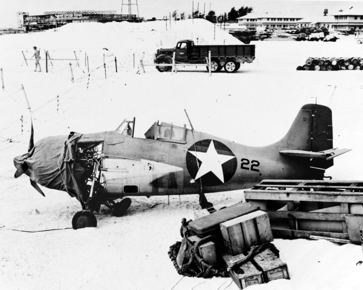 Damaged Grumman F4F-3 Wildcat of Marine fighter squadron VMF-221 parked on Midway after the battle