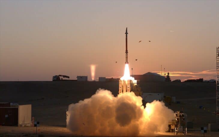 David's Sling interceptor lifting off at sunset above a desert launch site