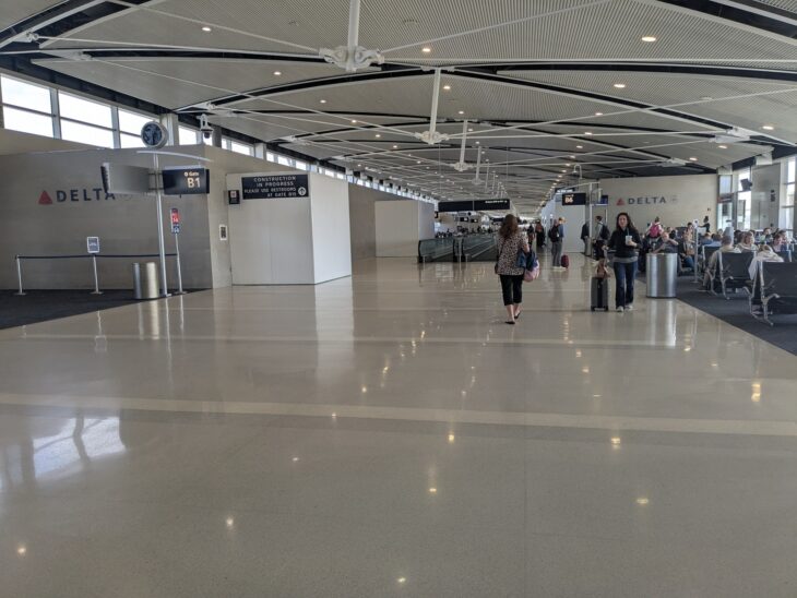 Concourse interior at Detroit Metropolitan Wayne County Airport with polished floors