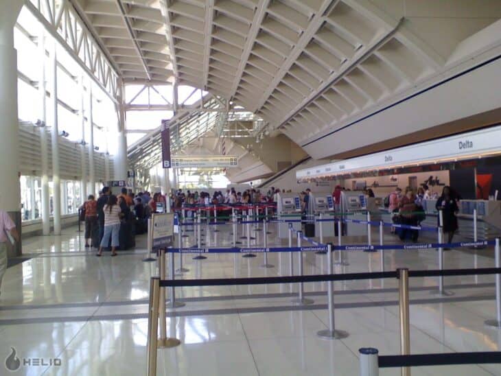 Interior of Ontario International Airport terminal with check-in counters