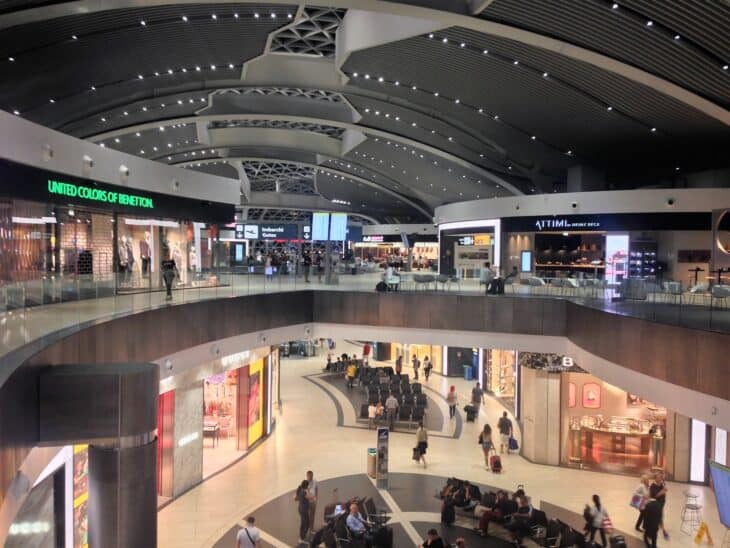 Multi-level shopping and dining hall at Rome Fiumicino Airport