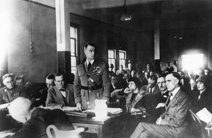 Billy Mitchell standing to speak in the packed 1925 court-martial room