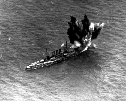 Aerial view of a 1921 bomb exploding at the bow of the German battleship Ostfriesland during the Army air tests