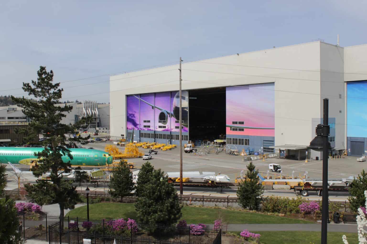 Boeing's Renton factory in Washington, where 737 MAX jets are built, seen from the south with a green-primed fuselage at left
