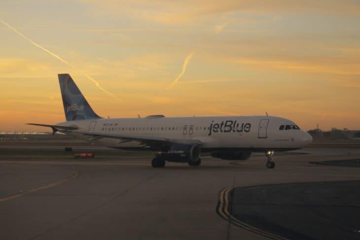 JetBlue Airbus A320 taxiing at sunset
