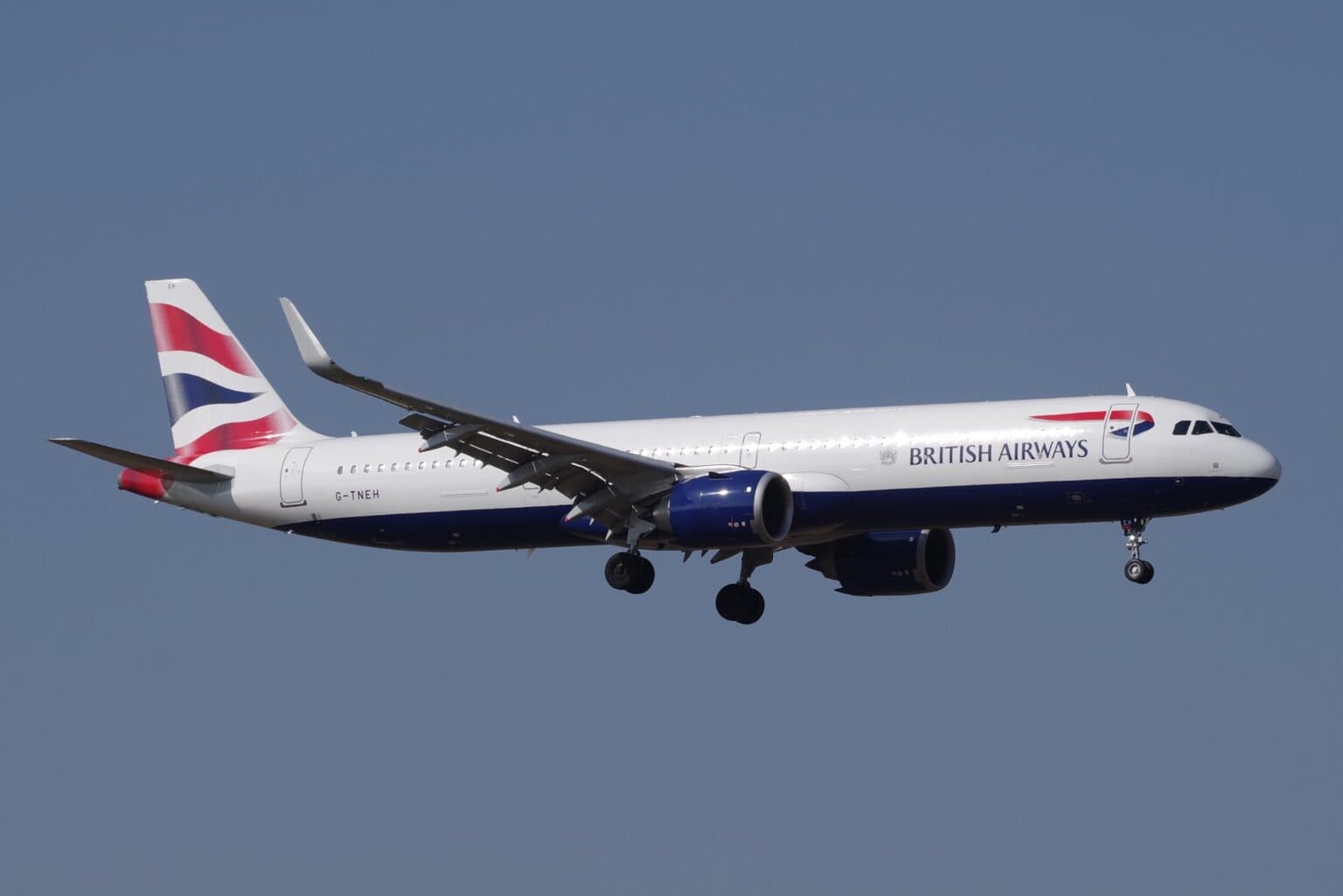 British Airways Airbus A321neo G-TNEH in flight with gear down