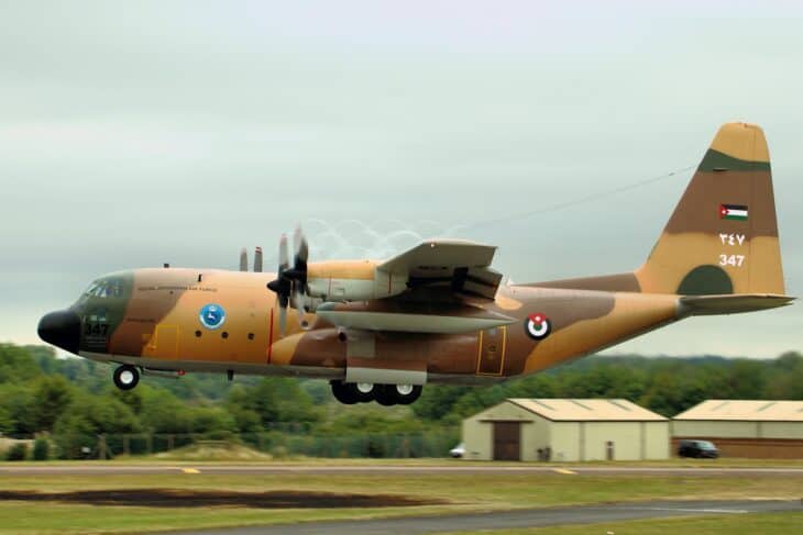 Royal Jordanian Air Force C-130H Hercules 347 in desert camouflage lifting off a runway