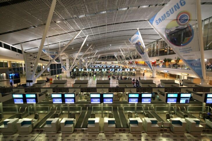 Rows of check-in desks in the departure hall at Cape Town International Airport