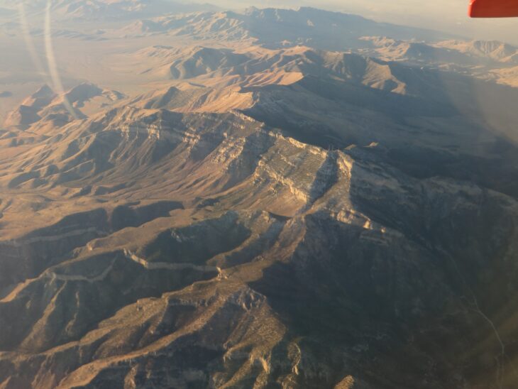 Aerial view of the rock faces and ridges of Potosi Mountain in Nevada