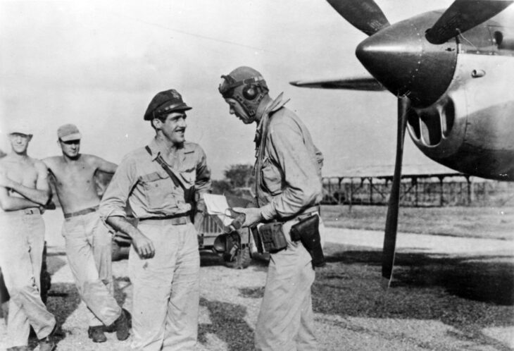 Charles Lindbergh talking with Maj. Thomas McGuire beside a P-38 Lightning in the Pacific