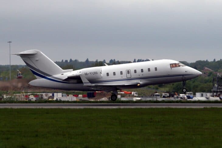 Bombardier Challenger 605 serial 5751 taking off as M-YUNI