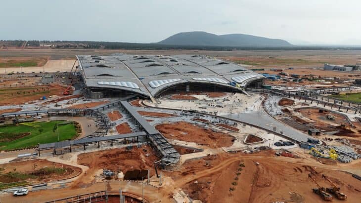 Aerial view of the terminal building of Alluri Sitarama Raju International Airport at Bhogapuram, still surrounded by construction work