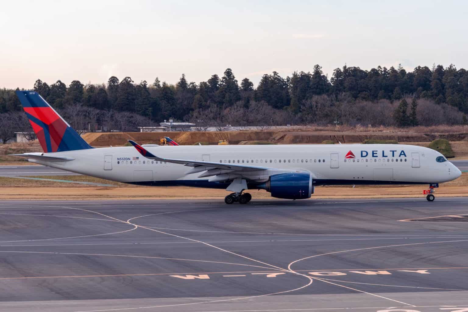 Delta Air Lines Airbus A350-900 N512DN taxiing, with its registration visible near the tail