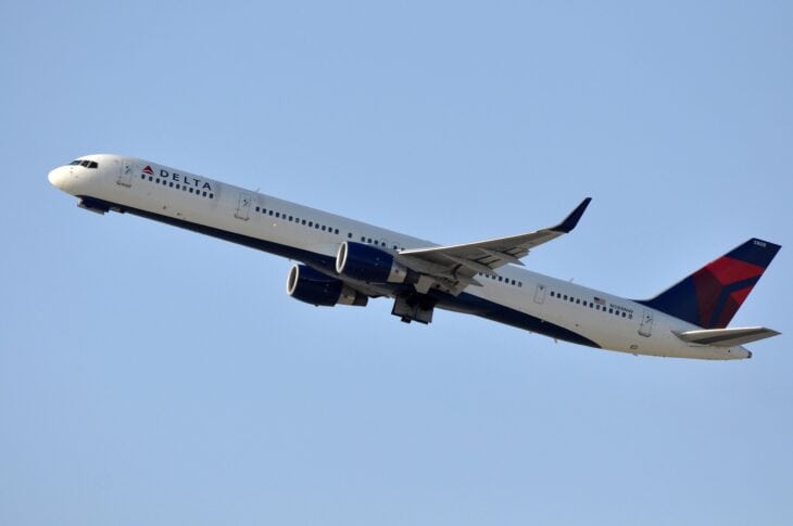 Delta Air Lines Boeing 757-300 N588NW climbing after takeoff with its landing gear retracting