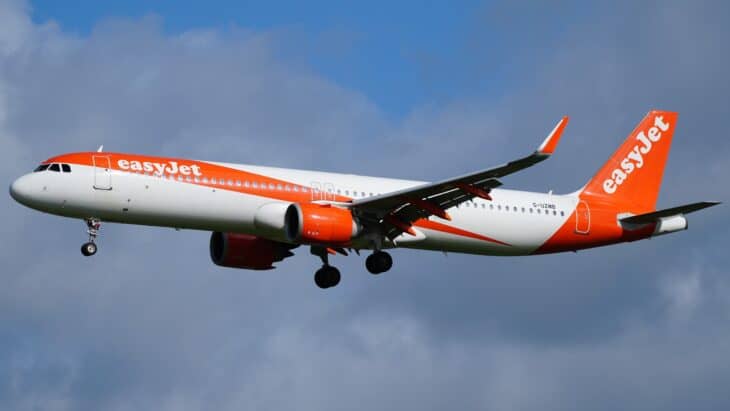 easyJet Airbus A321neo on approach with gear down in orange livery
