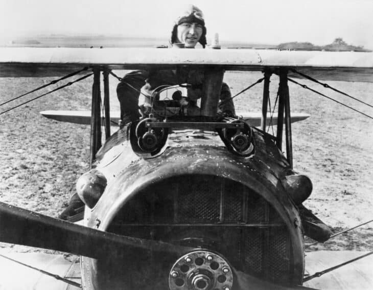 Eddie Rickenbacker seated in the cockpit of his SPAD fighter, seen head-on over the twin machine guns