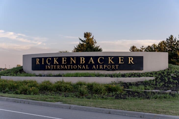 Rickenbacker International Airport entrance sign at sunset