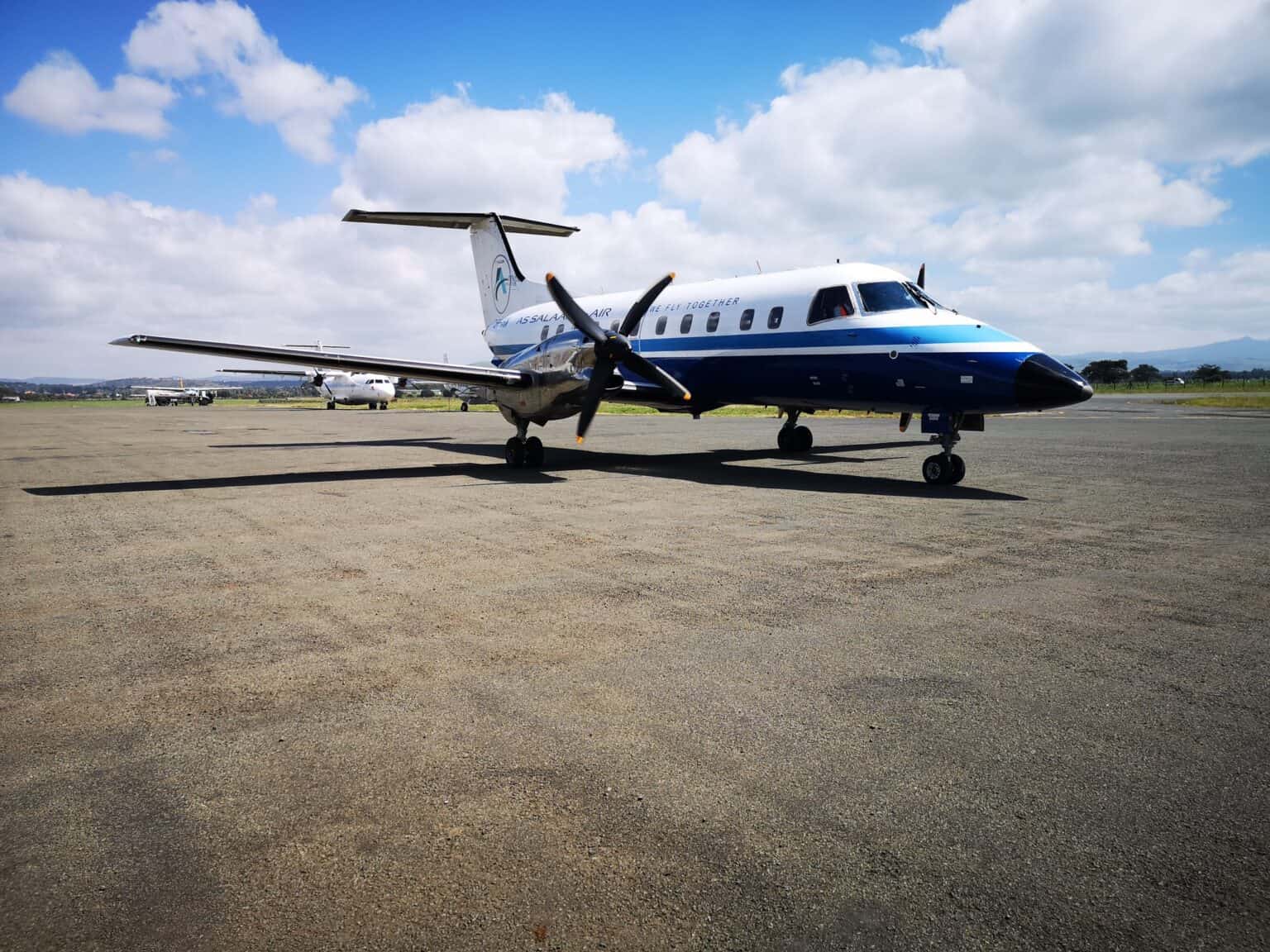 Embraer EMB 120 Brasilia 5H-IHN in As Salaam Air colors parked on the apron at Arusha, Tanzania