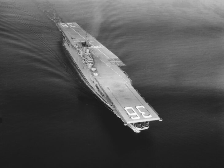 USS Antietam (CVA-36) at sea with the angled flight deck jutting out to port