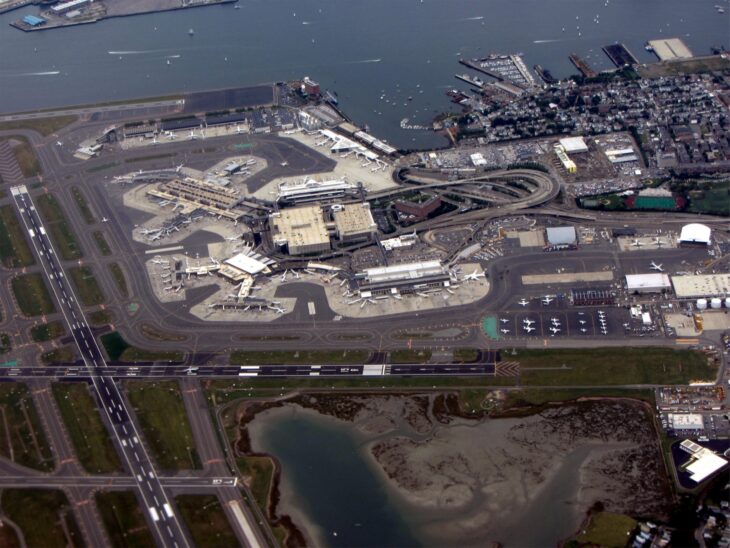 Aerial view of Boston Logan International Airport showing its runways, terminals and the harbour