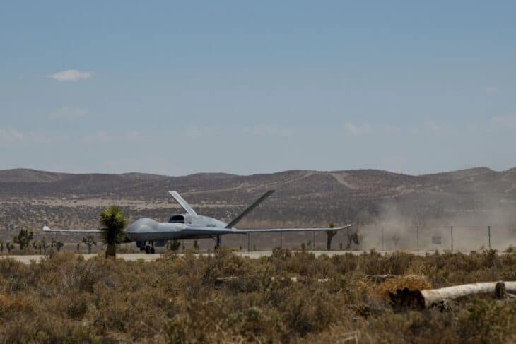 A General Atomics MQ-20 Avenger drone preparing for takeoff at El Mirage Airfield in the California desert