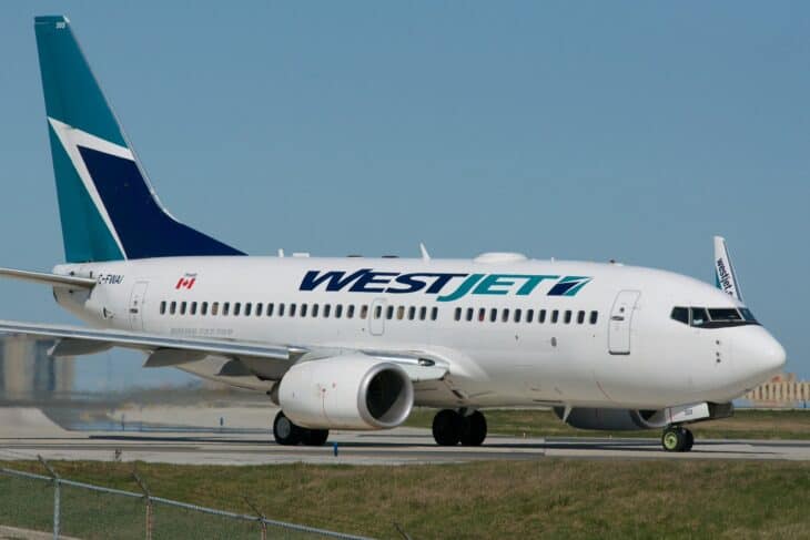 WestJet Boeing 737-700 taxiing on the runway