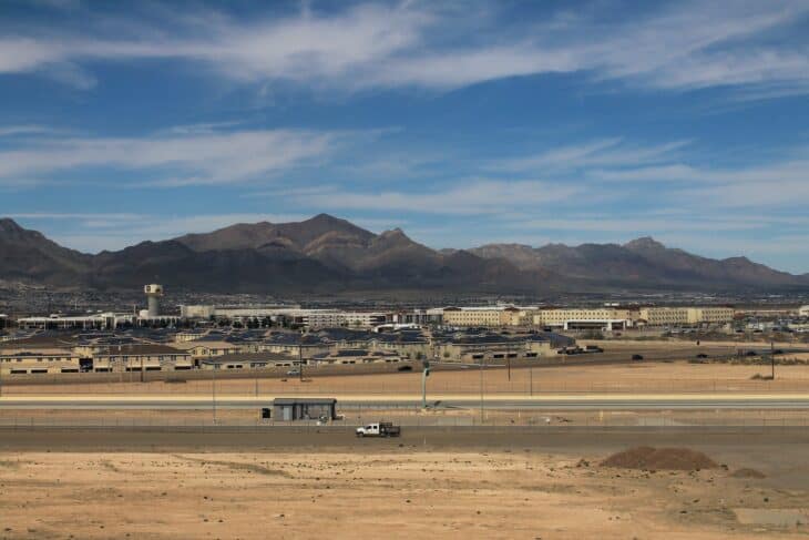 El Paso International Airport seen from an airliner window, with Fort Bliss alongside and mountains beyond
